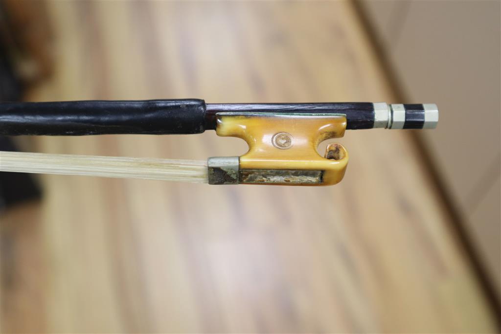 A 19th century Flemish? violin, length of back 35cm, cased with two bows